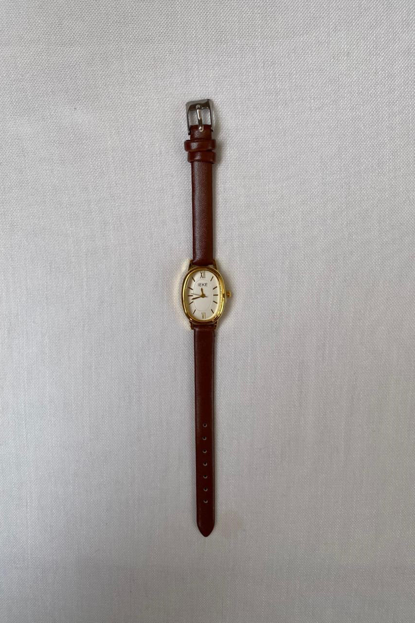 Chic Oval Dial Quartz Watch with Brown Leather Strap