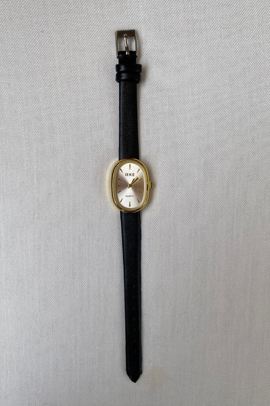 Chic Oval Dial Quartz Watch with Black Leather Strap