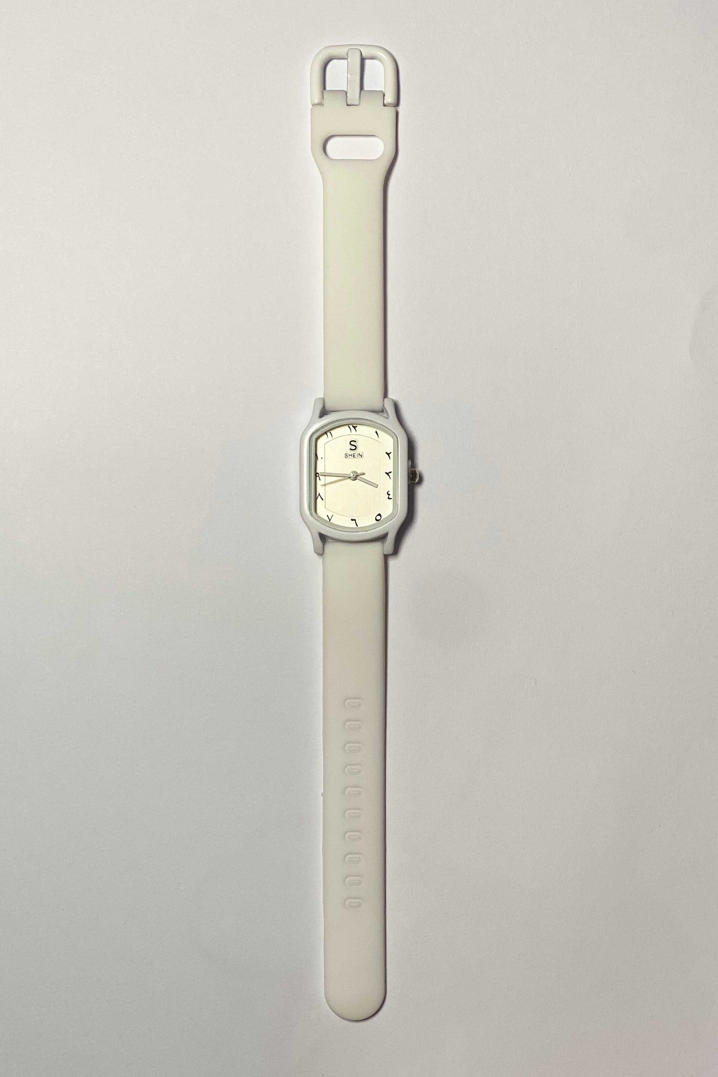 Modern White Watch with Eastern Arabic Numerals