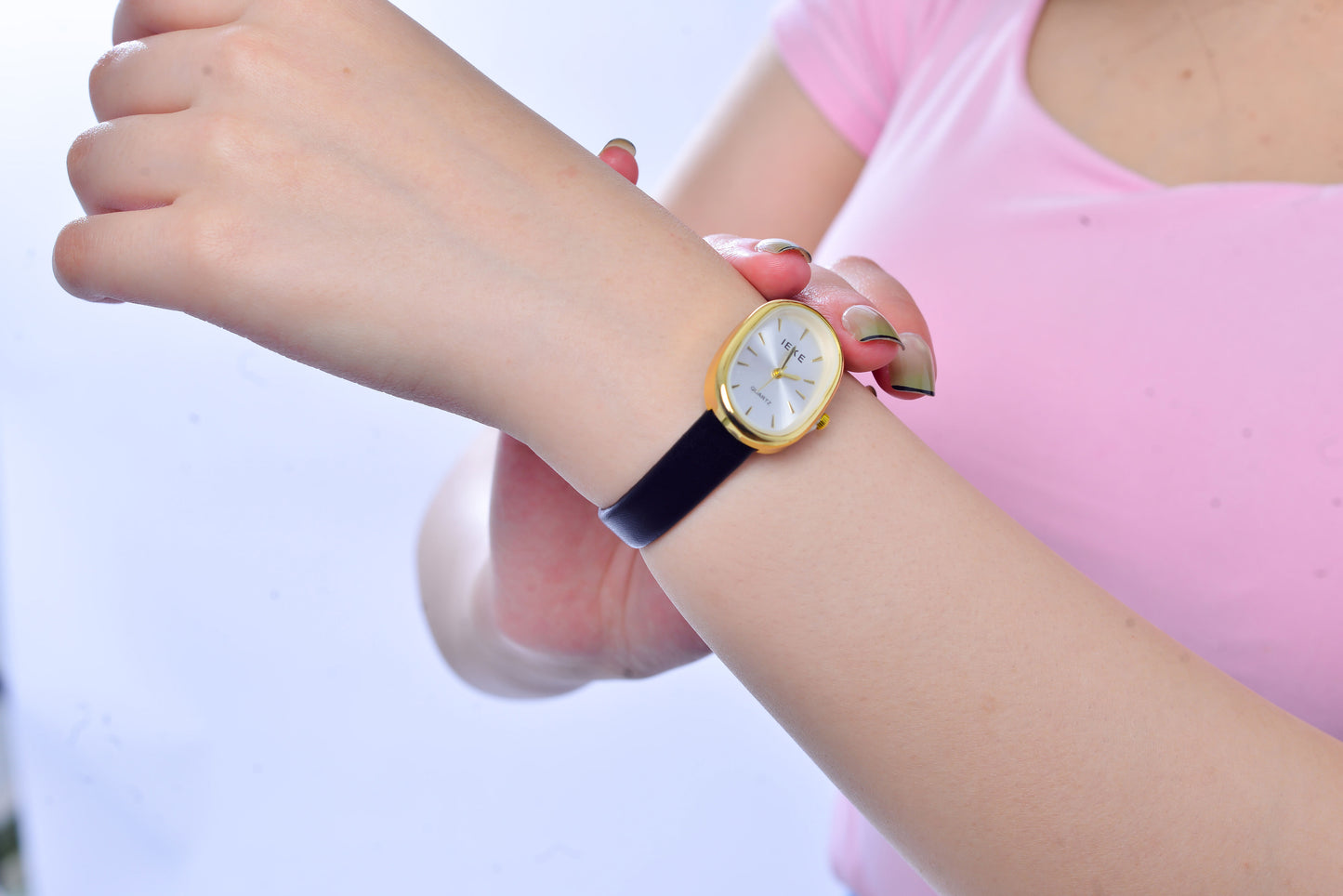 Chic Oval Dial Quartz Watch with Black Leather Strap