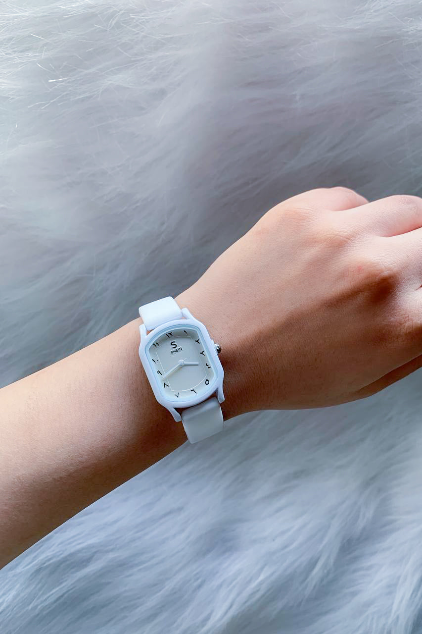 Modern White Watch with Eastern Arabic Numerals